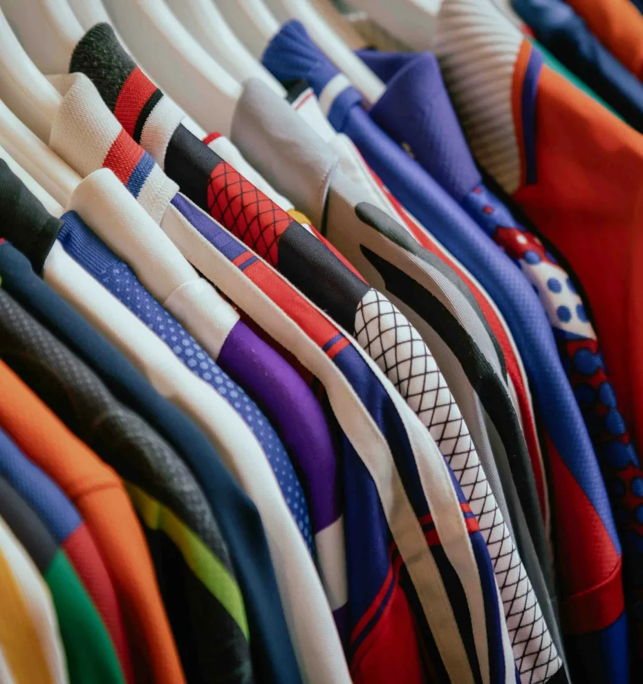 A rail of colourful clean clothing